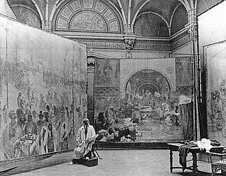 Alfons_Mucha_at_work_on_Slav_Epic_(1920)_330x257.jpg(39235 byte)
